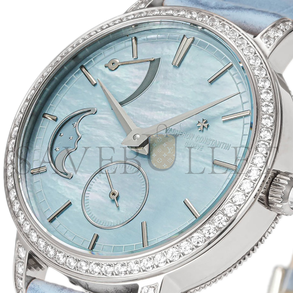 vacheron co*sta*t*n traditionelle moon phase blue mop dial with Di*m*nd bezel in white gold on blue leather strap watch 83570/000g-9916